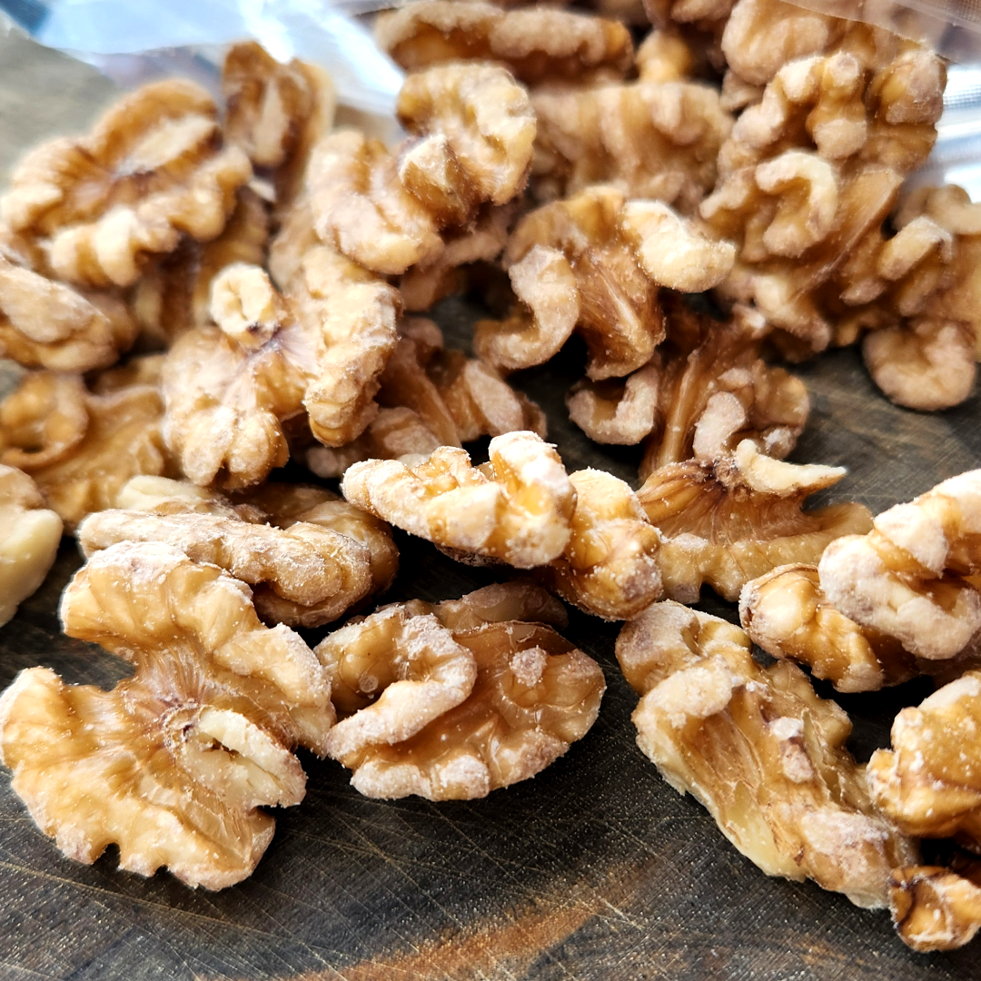 Close-up of walnuts on a wooden surface
